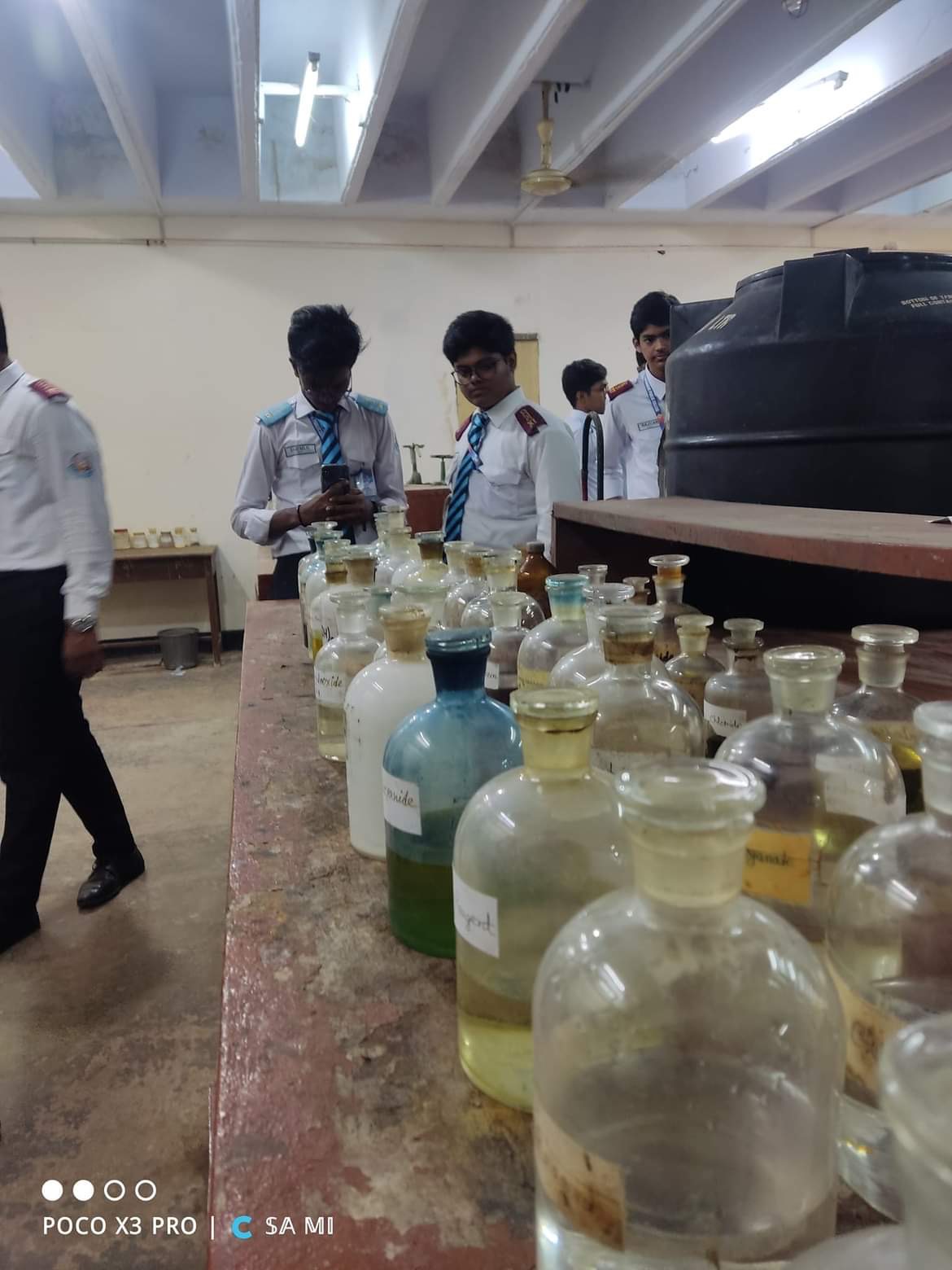 Reagent shelf · labelled bottles at CU Chemistry Department